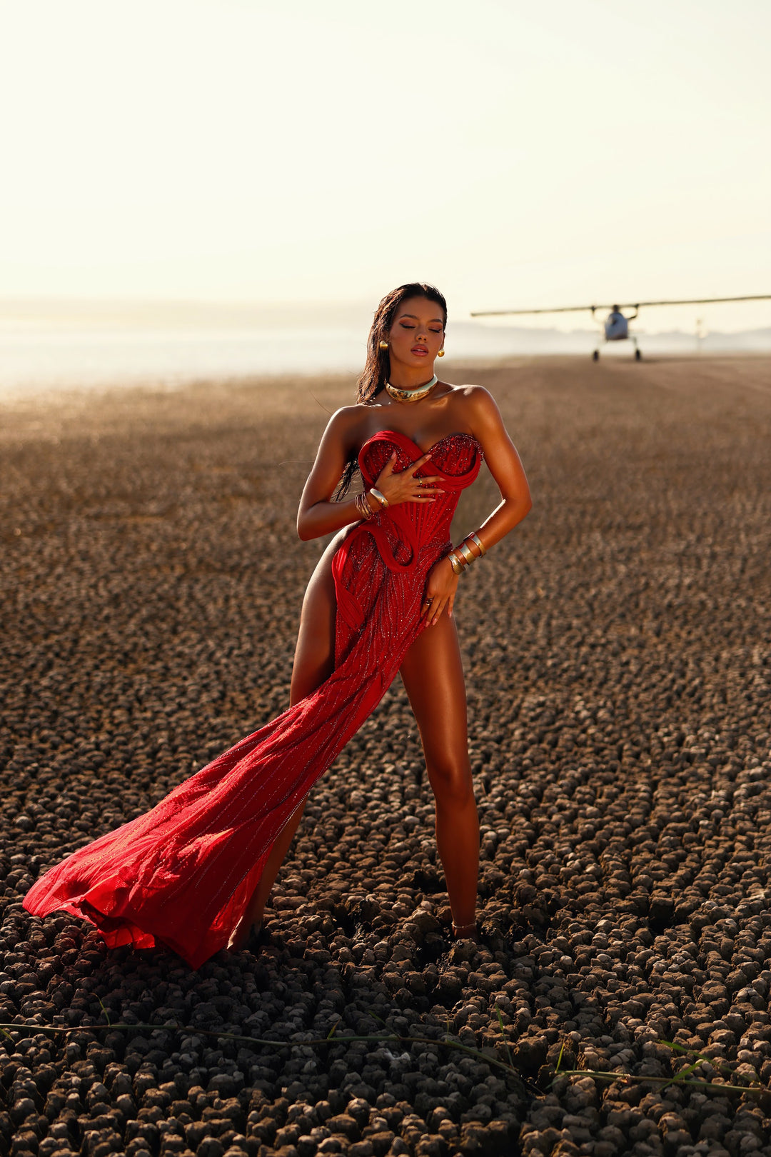 Delilah LD21161 Strapless Swirl Crystal Corset Mermaid Gown with Puff Sleeves and Slit - Red front view