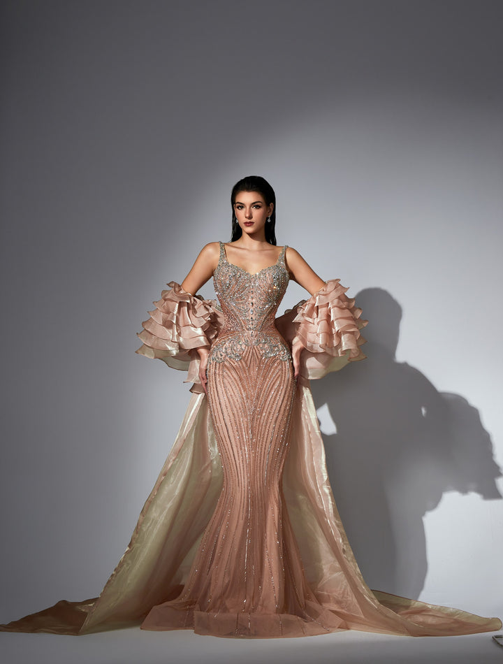 Delilah LD11585 Spaghetti Strap Crystal Corset Mermaid Gown with Ruffle Sleeves and Overskirt - Champagne front view