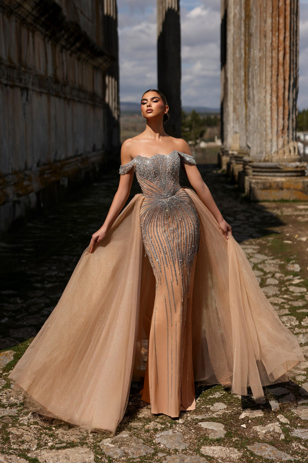Delilah LD11490 Off-the-Shoulder Scalloped Sweetheart Beaded Corset Gown with Sparkle Overskirt - Champagne front view