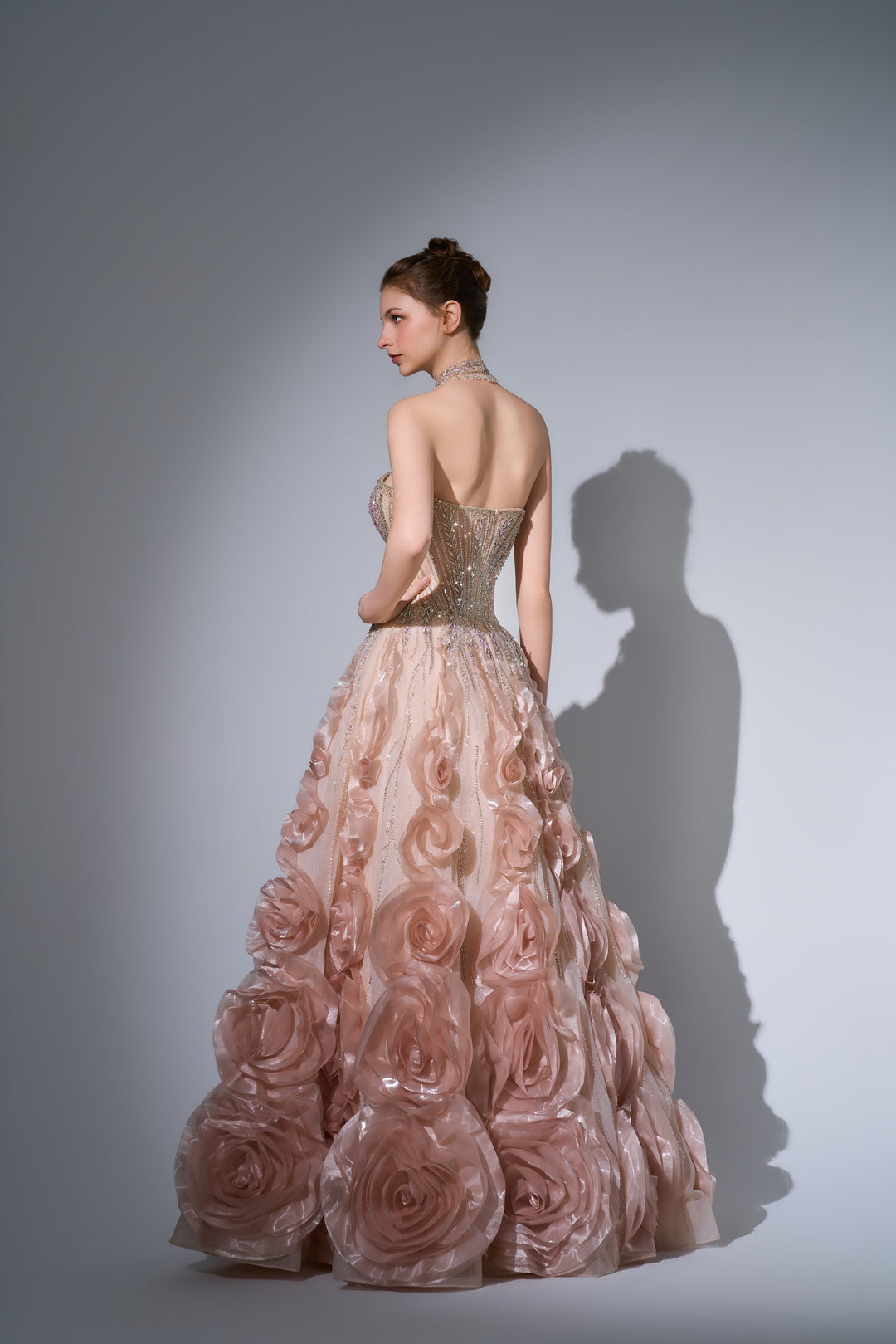 Delilah SH12068 Maxi Strapless Crystal Corset Ball Gown with 3D Rosette Skirt - Champagne back view