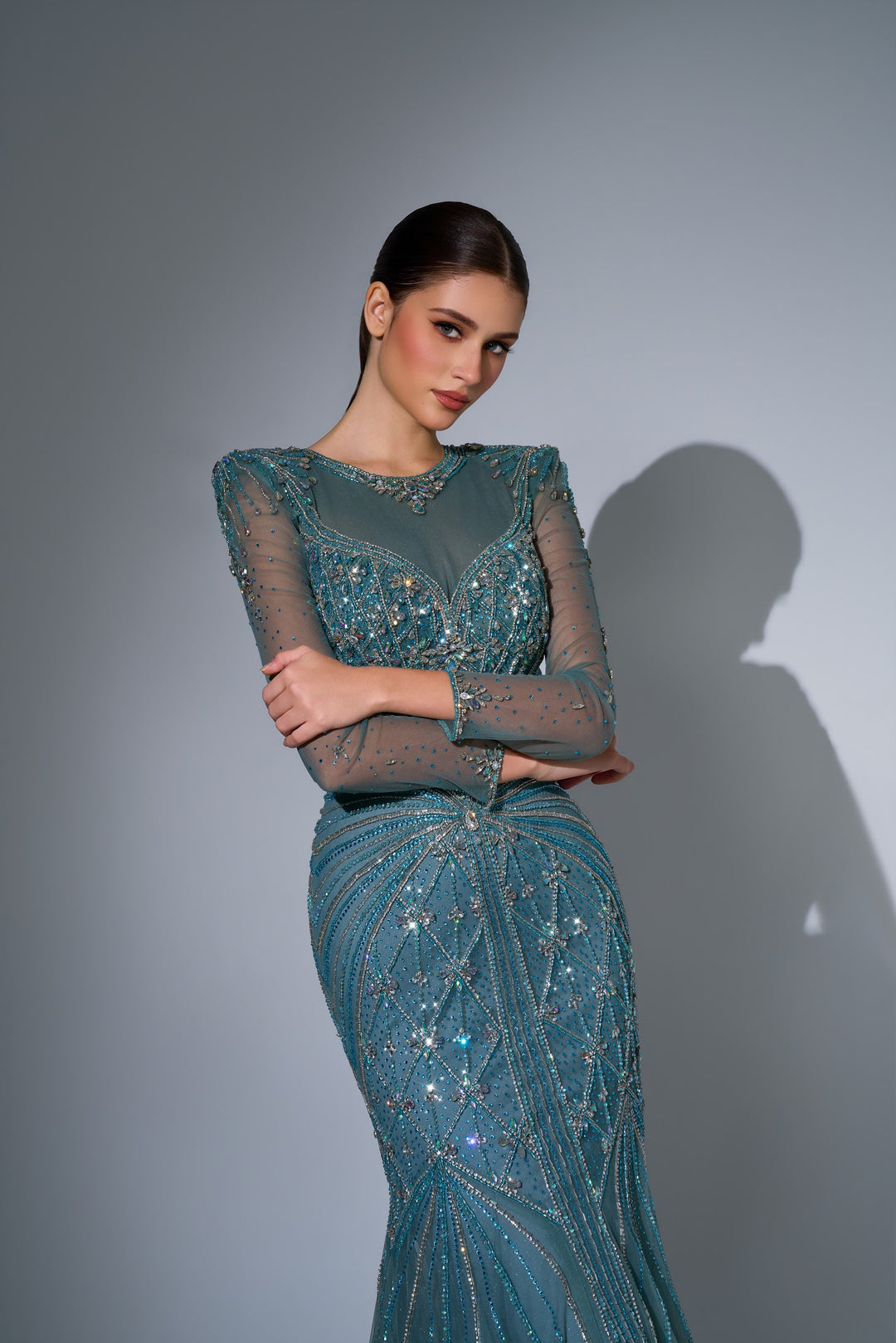 Delilah LD11592 Illusion High Neck Long Sleeve Sunburst Beaded Mermaid Gown - Green close-up view