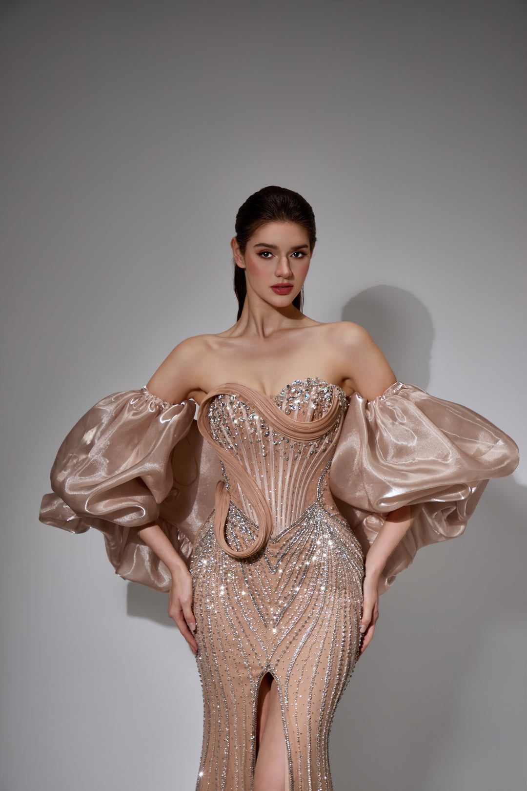 Delilah LD21161 Strapless Swirl Crystal Corset Mermaid Gown with Puff Sleeves and Slit - Champagne close-up view