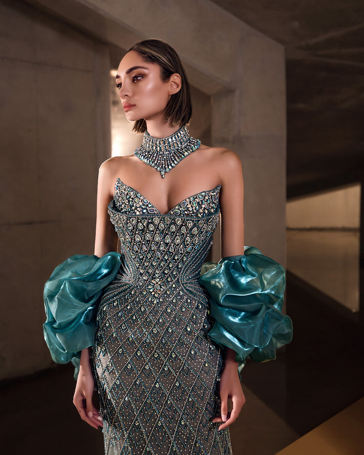 Delilah LD11689 Strapless Plunging Crystal Lattice Mermaid Gown with Puff Sleeves - Green close-up view