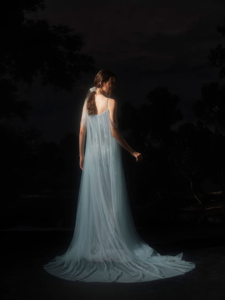 Delilah SH12078 Spaghetti Strap Crystal Beaded Mermaid Gown with Sheer Tulle Cape - G.Blue back view