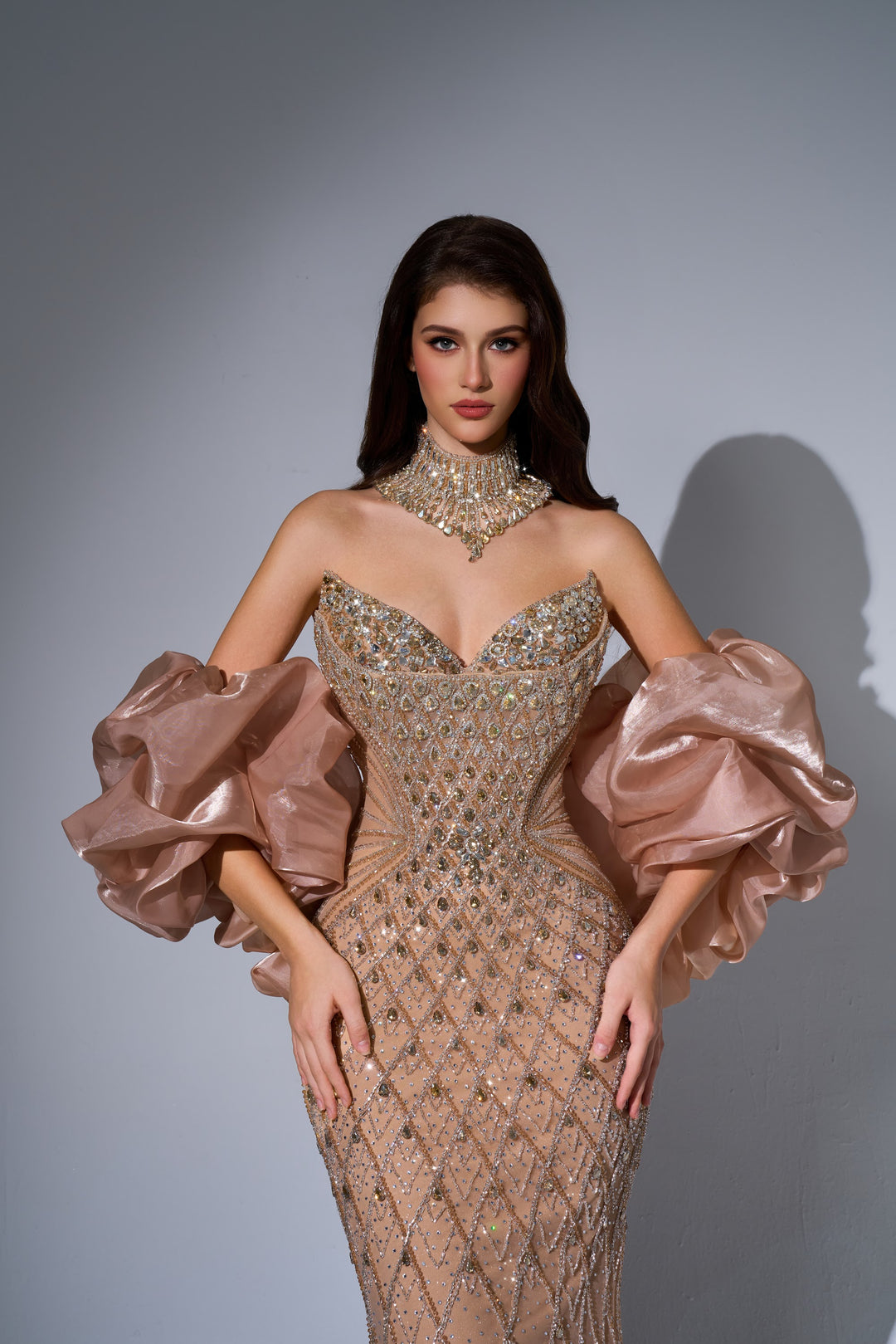 Delilah LD11689 Strapless Plunging Crystal Lattice Mermaid Gown with Puff Sleeves - Champagne close-up view