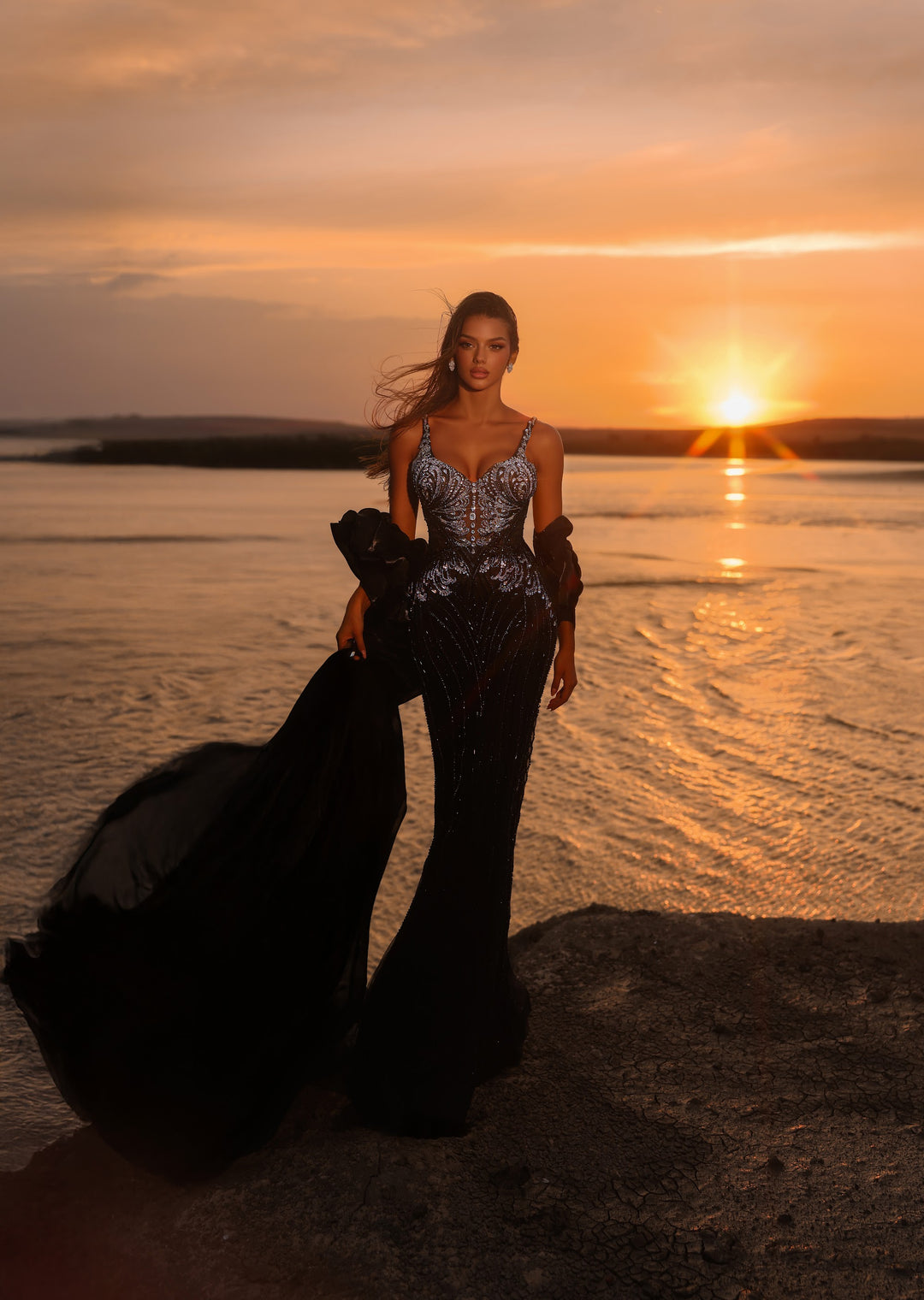 Delilah LD11585 Spaghetti Strap Crystal Corset Mermaid Gown with Ruffle Sleeves and Overskirt - Black front view