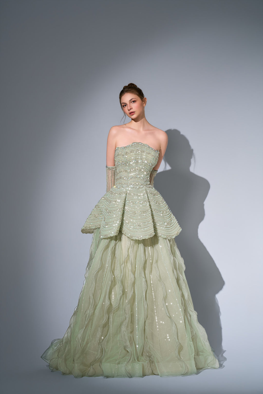 Delilah SH12091 Strapless Beaded Tiered Peplum Ball Gown with Ruffled Tulle Skirt - Mint front view