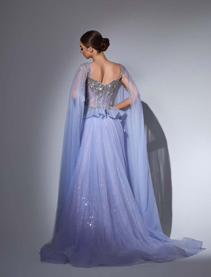 Delilah LD11214 Plunging Sweetheart Beaded Corset Mermaid Gown with Cape Sleeves and Overskirt - Blue back view
