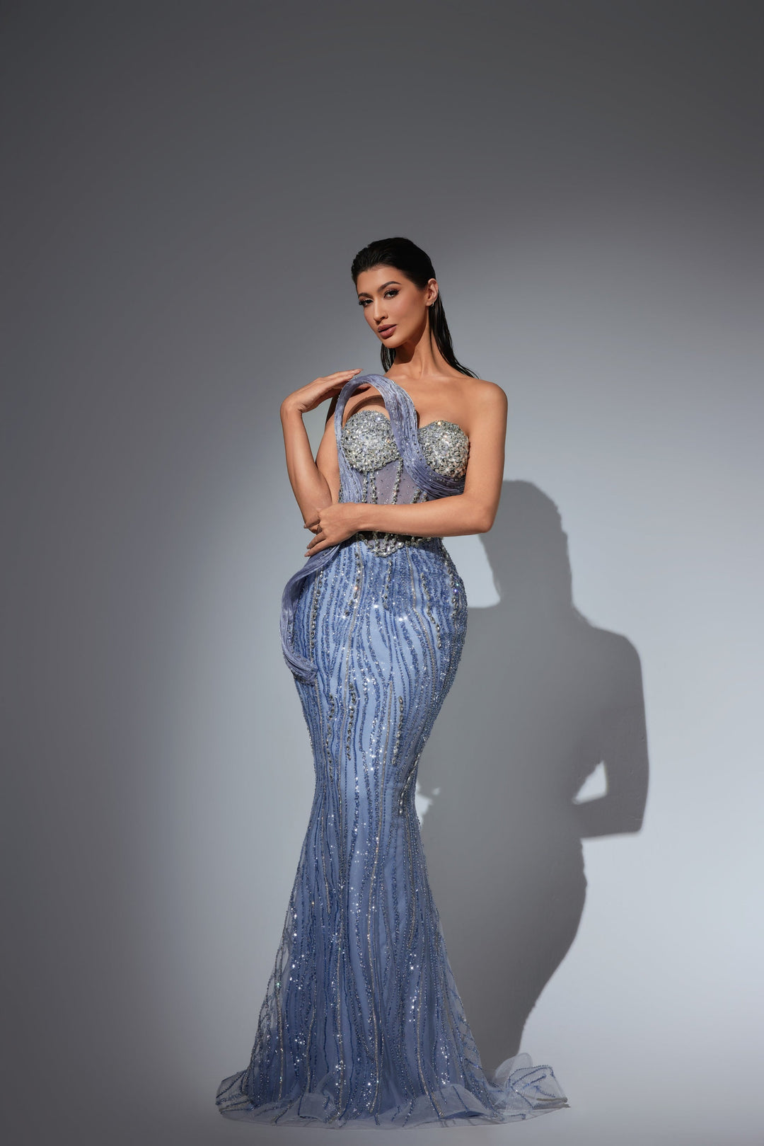 Delilah LD22039 Strapless Crystal Cup Corset Mermaid Gown with Sculpted Swirl Detail - Blue front view