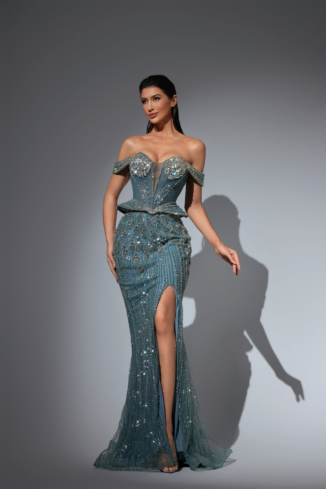 Delilah LD21130 Off-the-Shoulder Plunging Corset Sheath Gown with Peplum and Slit - Sage front view