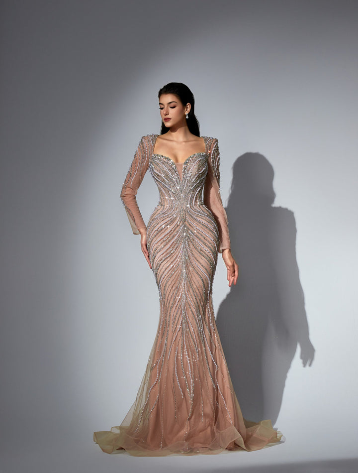 Delilah LD11475 Plunging Illusion Long Sleeve Beaded Corset Sheath Gown with Overskirt - Champagne front view