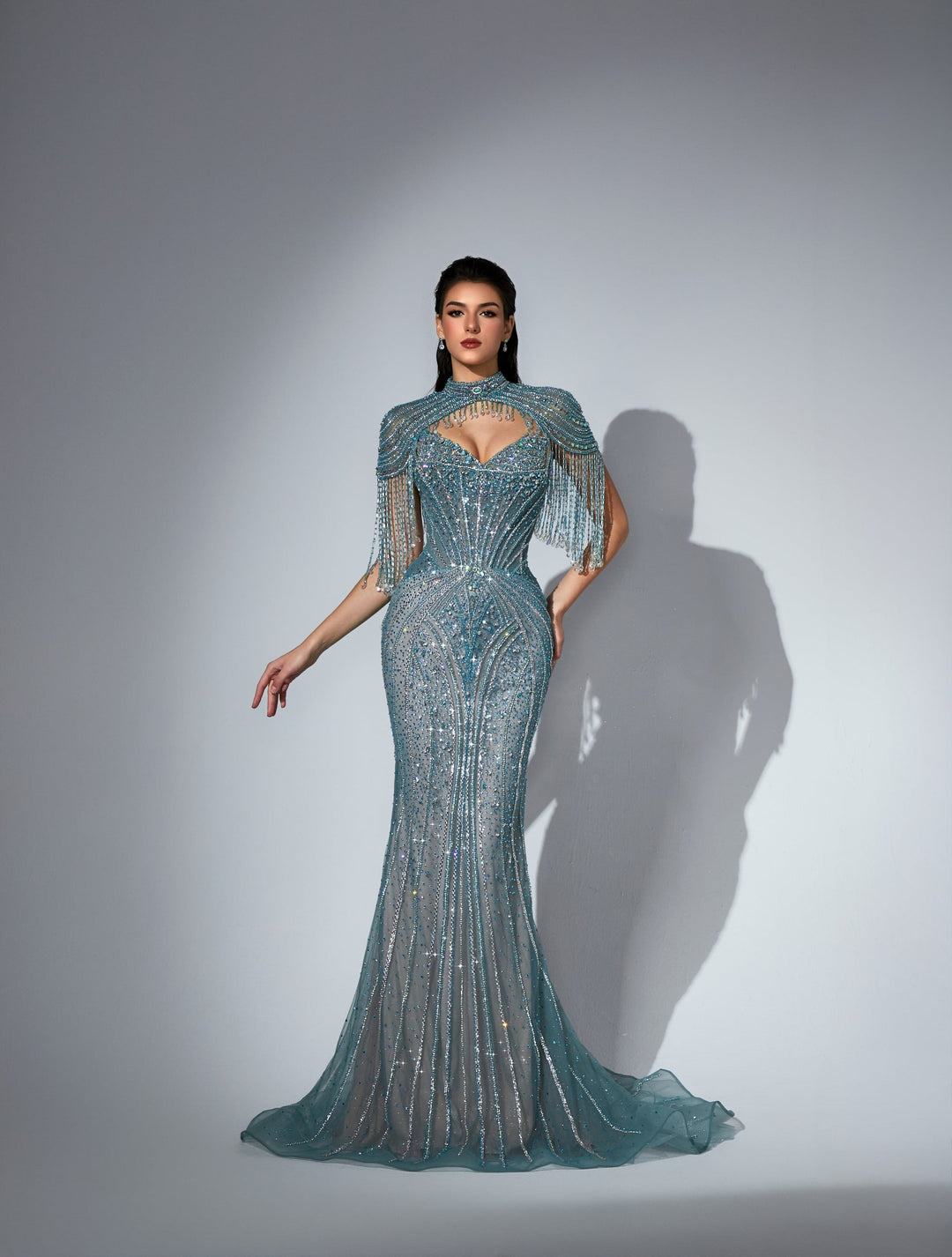 Delilah LD11596 Beaded Corset Sheath Gown with High Choker Collar and Crystal Fringe Shoulders - Green front view