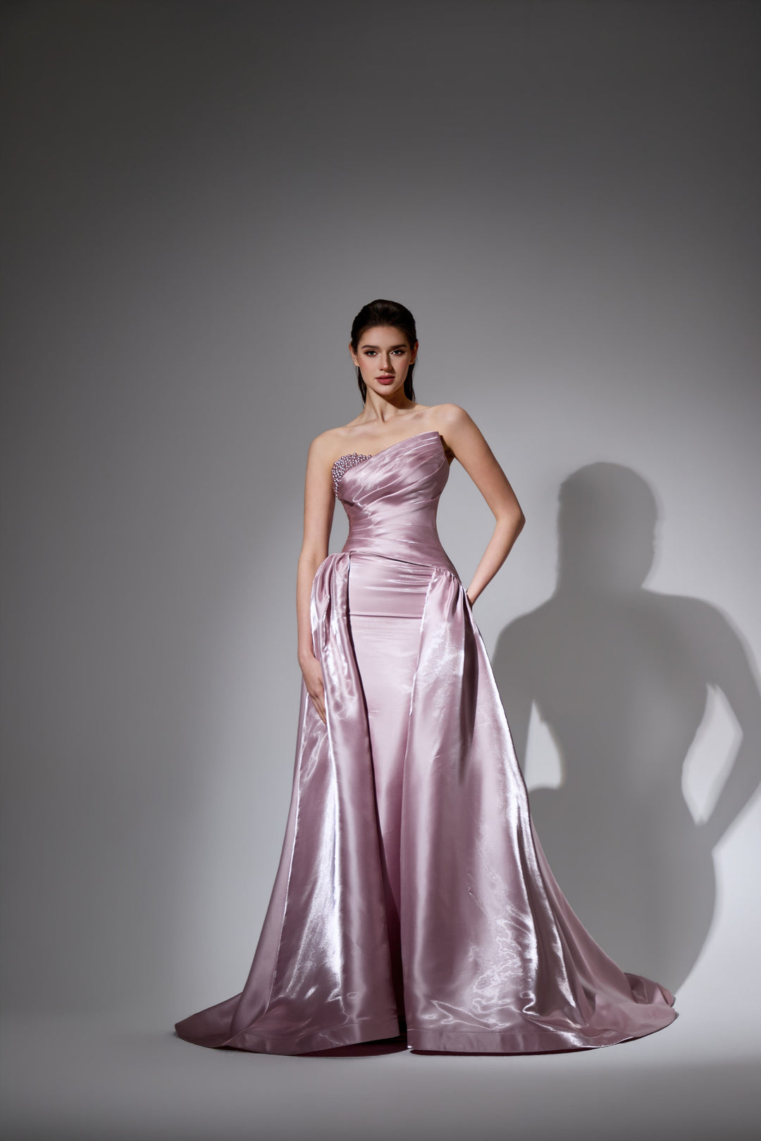 Delilah LD41026 Strapless Asymmetric Draped Sheath Gown with Beaded Accent and Overskirt Train - Pink front view