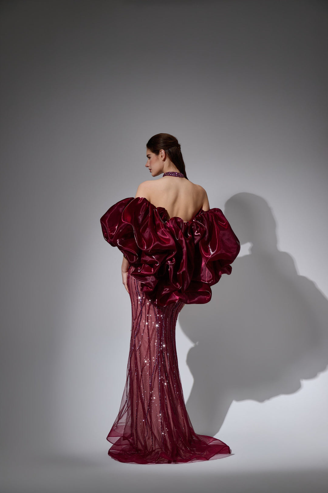 Delilah LD12056 Strapless Sweetheart Beaded Sheath Gown with Oversized Ruffled Arm Puffs - Red back view