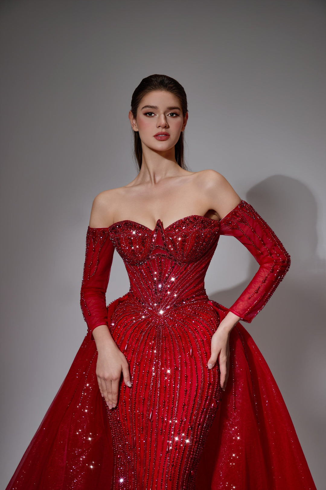 Delilah LD11539 Off-the-Shoulder Long Sleeve Beaded Corset Sheath Gown with Sparkle Overskirt - Red close-up view