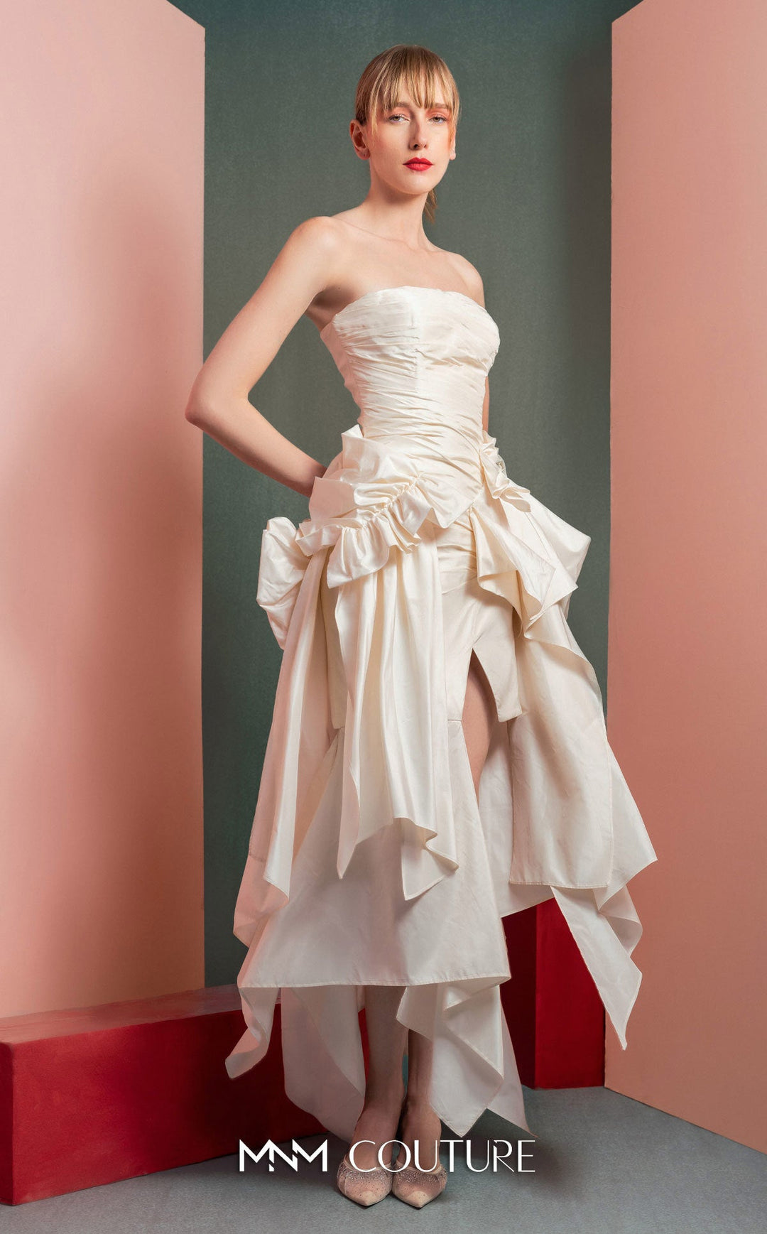 Gaby Charbachy GOF2519 strapless ruched dress with sculpted bows and high-low skirt three-quarter view
