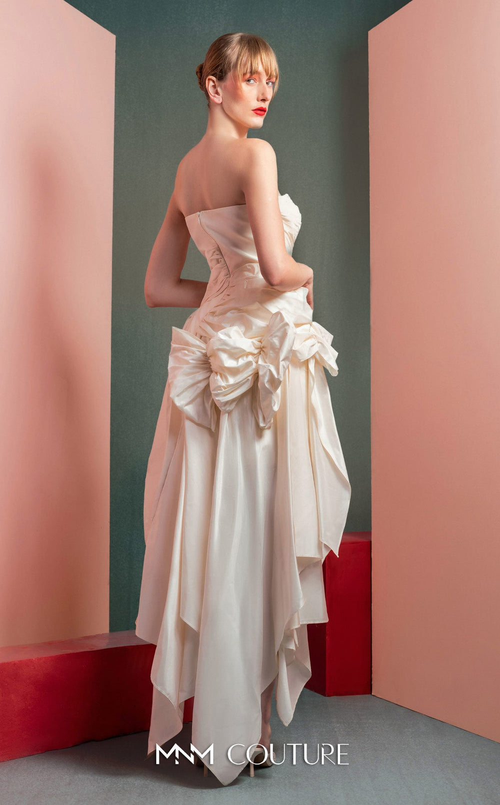 Gaby Charbachy GOF2519 strapless ruched dress with sculpted bows and high-low skirt back view