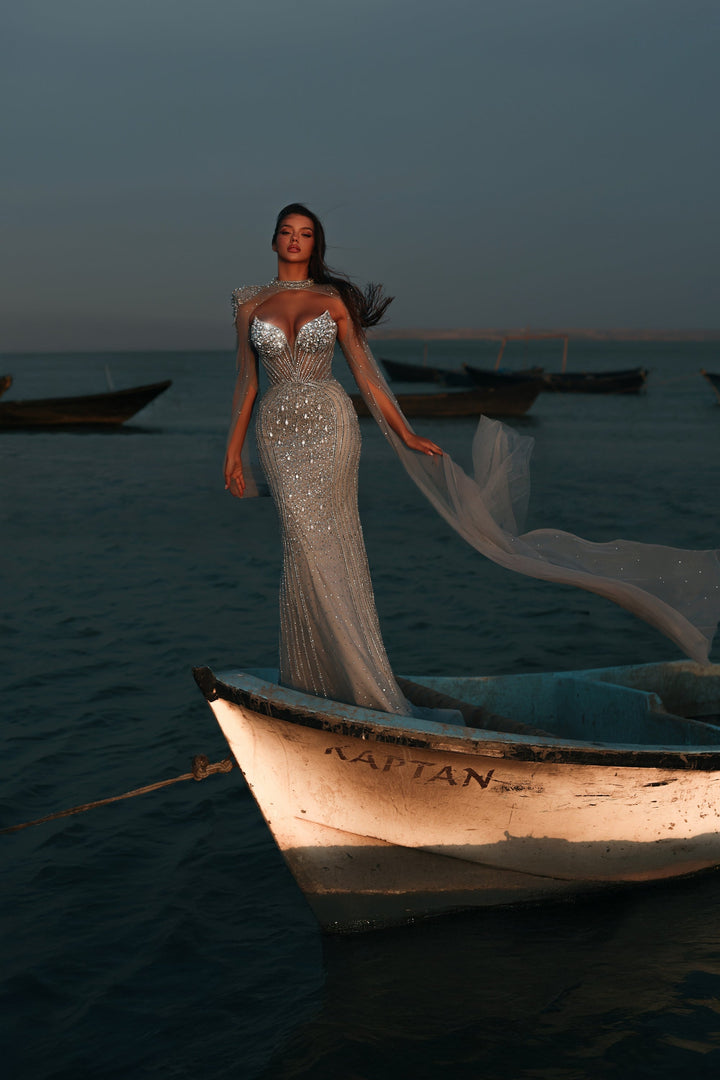 Delilah LD11478 Strapless Beaded Corset Mermaid Gown with Choker Capelet and Floor-Length Cape Sleeves - Blue front view