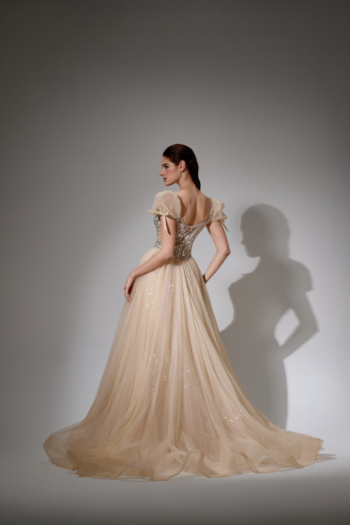 Delilah SH11608 Plunging Beaded Corset Ball Gown with Puff Sleeves - Champagne back view