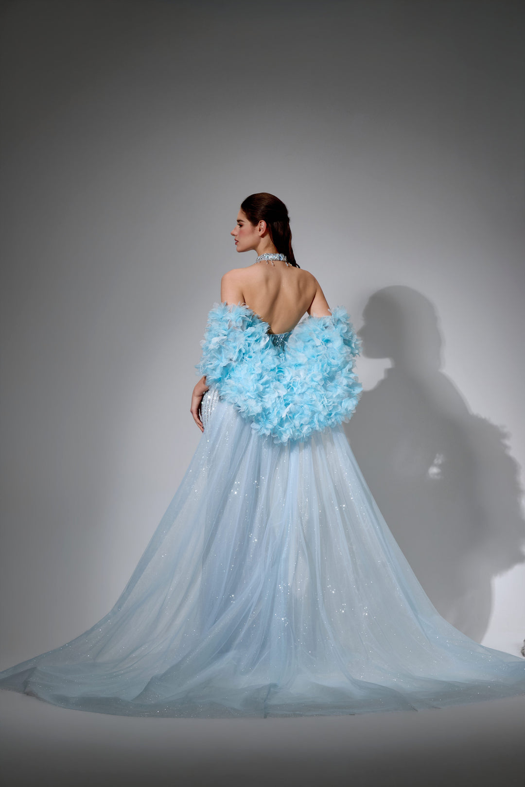 Delilah SH12045 Beaded Halter Plunging Mermaid Gown with Ruffled Arm Puffs and Overskirt - Blue back view